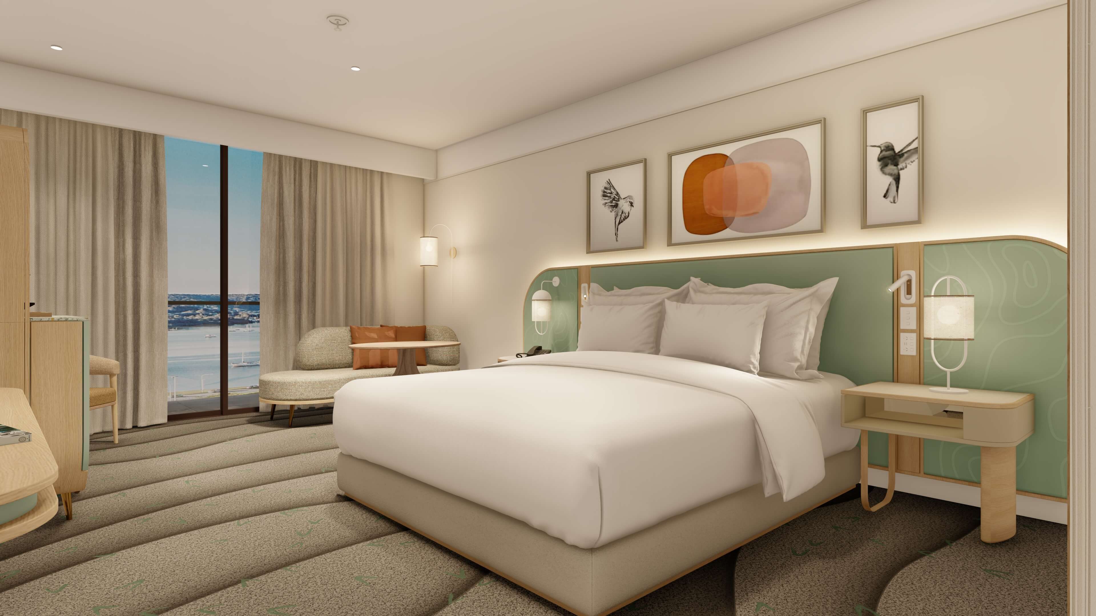 A hotel bedroom with a waterview